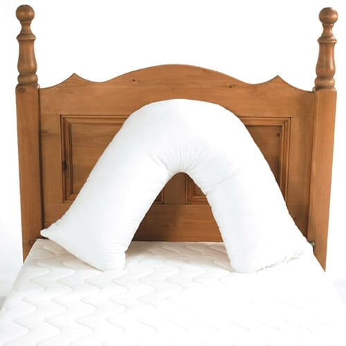 Full view of V Shaped Back Support Pillow cushion on a plain background, showing its shape and supportive material.