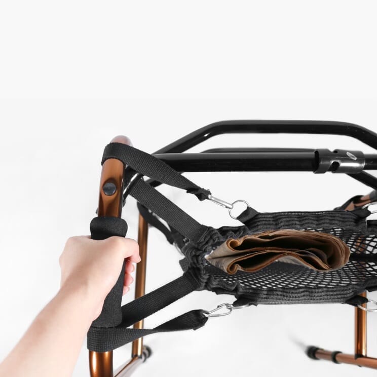 Walker Net Bag in use: an older adult using the frame at home to move confidently and independently.