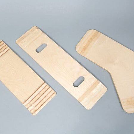 Close-up of the control panel or handset of Wooden Transfer Board hoist, showing buttons and indicators.