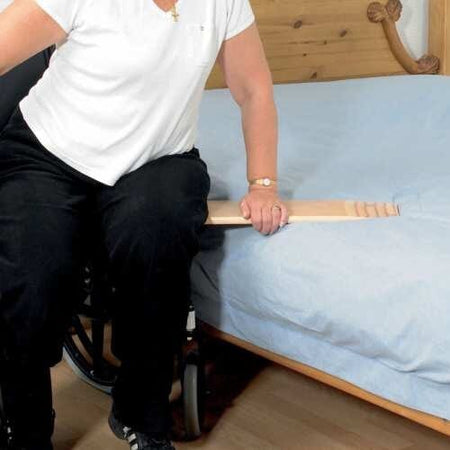 Wooden Transfer Board hoist folded or disassembled for storage or transport.