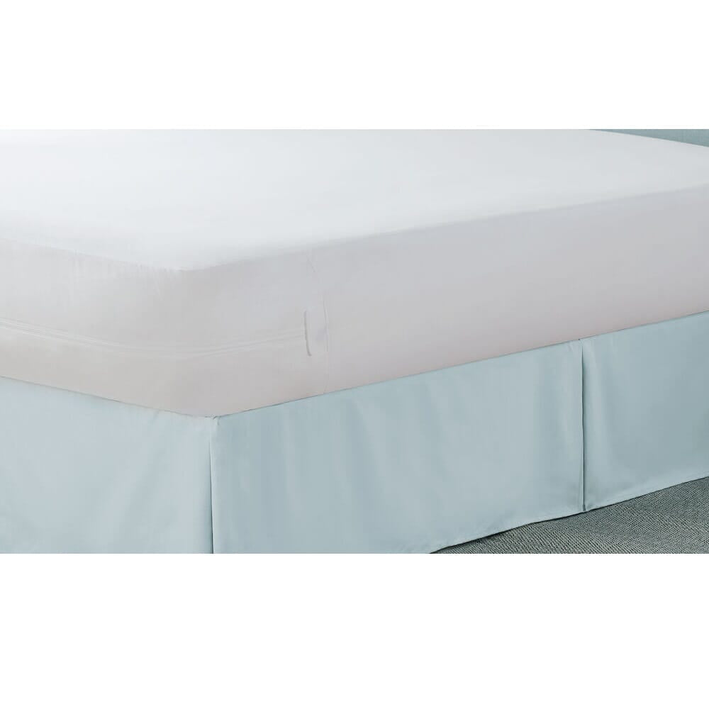 Zipped Waterproof Mattress Protector fitted on a mattress, demonstrating coverage and fit.